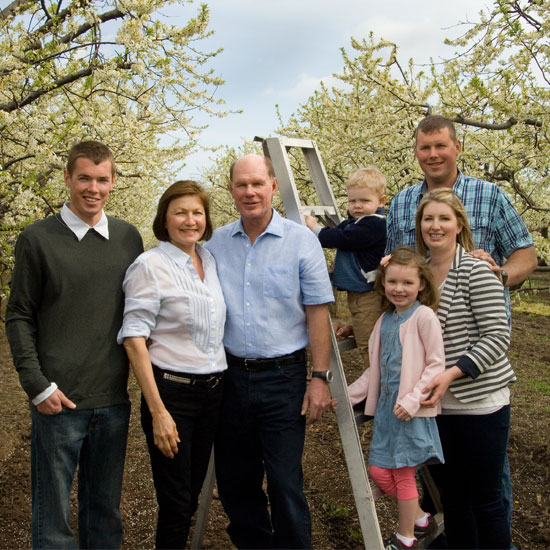 Tregunno family members posing in their orchard